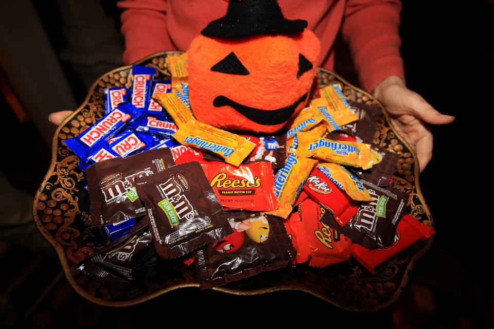 <p>Chocolate candy—in any variety—is America's favorite Halloween candy. Almost 75 percent of all the candy consumed this year is some form of chocolate. Reese's and M&M's are two of the most popular Halloween candies, according to <a href="http://www.usatoday.com/story/money/business/2013/10/27/most-popular-halloween-candy-in-usa/3274967/" rel="nofollow noopener" target="_blank" data-ylk="slk:USA Today;elm:context_link;itc:0;sec:content-canvas" class="link "><em>USA Today</em></a>. </p>