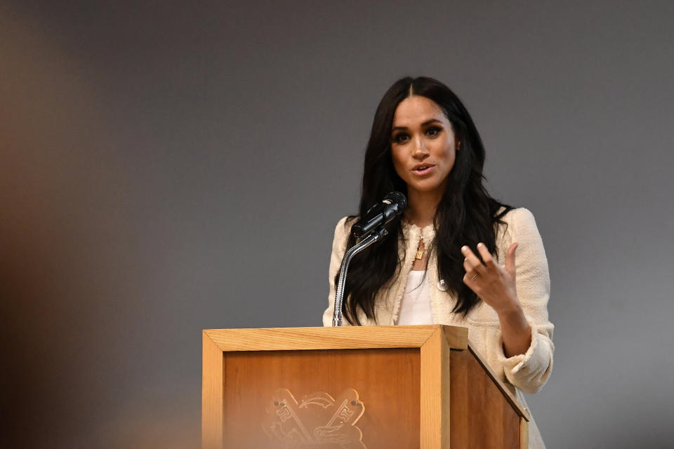 The Duchess of Sussex speaks during a school assembly as part of a visit to Robert Clack School in Essex on March 6, in support of International Women's Day.&nbsp; (Photo: POOL New / Reuters)