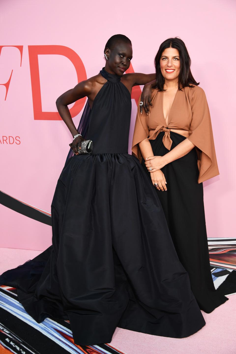 <h1 class="title">Alek Wek in Rosie Assoulin with Ana Khouri earrings and ring and Rosie Assoulin</h1><cite class="credit">Photo: Getty Images</cite>