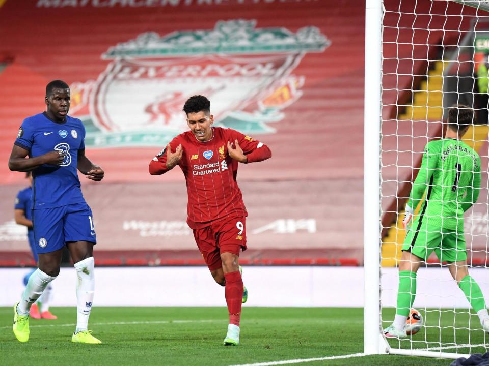 Firmino celebrates scoring against Chelsea: Getty