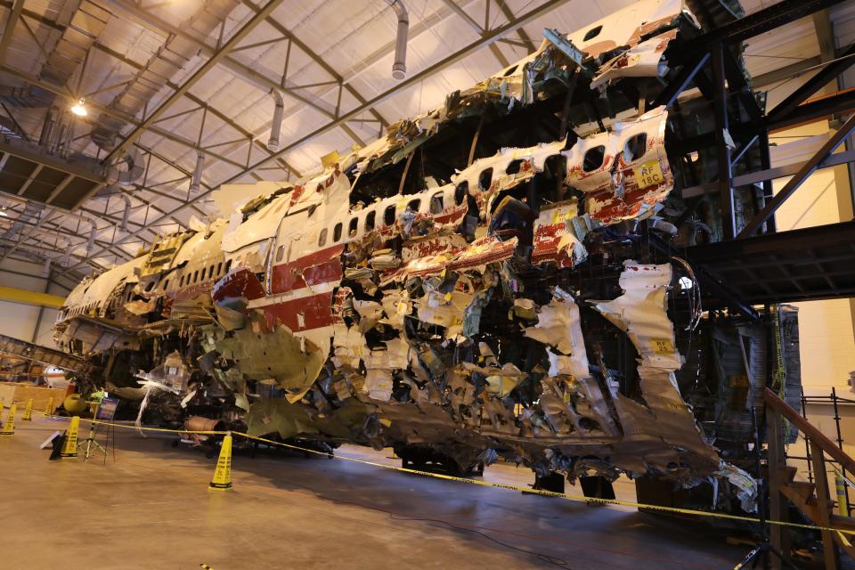 Parts of the fuselage of the Boeing 747 that carried TWA Flight 800, which crashed off the coast of Long Island 25 years ago, have been stored in a large laboratory at aGeorge Washington University campus in Ashburn, Virginia. The crash claimed 230 lives on July 17, 1996.