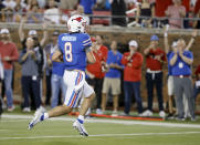 SMU quarterback Tanner Mordecai (8) runs for a touchdown against Tulane during the first half of an NCAA college football game in Dallas, Thursday, Oct. 21, 2021. (AP Photo/Michael Ainsworth)