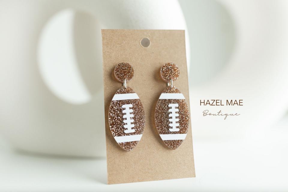 <p><a href="https://go.redirectingat.com?id=74968X1596630&url=https%3A%2F%2Fwww.etsy.com%2Flisting%2F1396699087%2Ffootball-earrings-acrylic-earrings-super&sref=https%3A%2F%2Fwww.thepioneerwoman.com%2Ffashion-style%2Fg41915916%2Fthanksgiving-earrings%2F" rel="nofollow noopener" target="_blank" data-ylk="slk:Shop Now;elm:context_link;itc:0;sec:content-canvas" class="link ">Shop Now</a></p><p>Acrylic Football Earrings</p><p>$14.99</p><p>etsy.com</p><span class="copyright">Etsy</span>