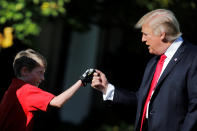 <p>President Donald Trump shakes hands with 11-years-old Frank Giaccio as he cuts the Rose Garden grass at the White House in Washington, U.S., September 15, 2017. Frank, who wrote a letter to Trump offering to mow the White House lawn, was invited to work for a day at the White House along the National Park Service staff. (Photo: Carlos Barria/Reuters) </p>