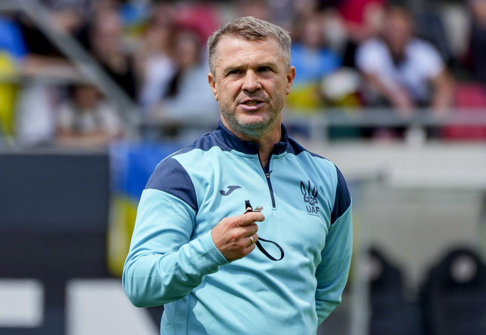 Ukraine's head coach Serhiy Rebrov watches his team during a public training session in Wiesbaden, Germany, Thursday, June 13, 2024, ahead of their group E match against Romania at the Euro 2024 soccer tournament. (AP Photo/Michael Probst)