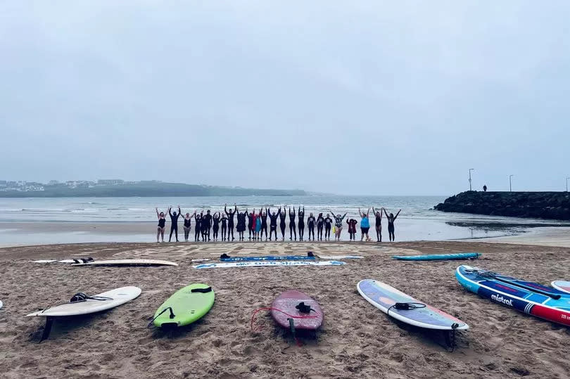 Surfers and swimmers who took part in a national day of protest against sewage in our waters at Portrush West Strand