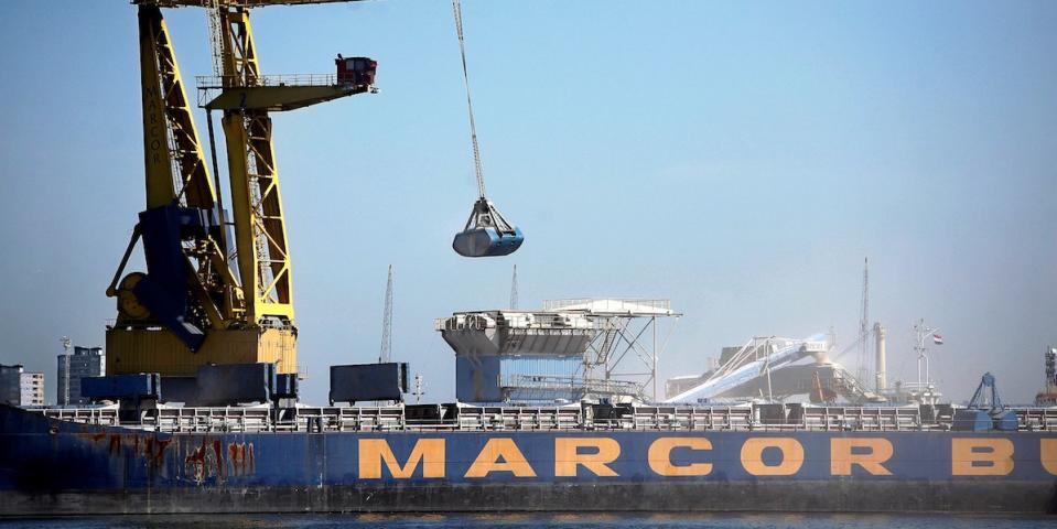 Bulk goods are off-loaded at a Rotterdam shipping company in the Waalhaven June 2, 2009.