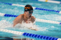 Nic Fink swims on his way to winning the men's 50-meter breaststroke event at the U.S. nationals swimming meet in Indianapolis, Thursday, June 29, 2023. (AP Photo/Michael Conroy)