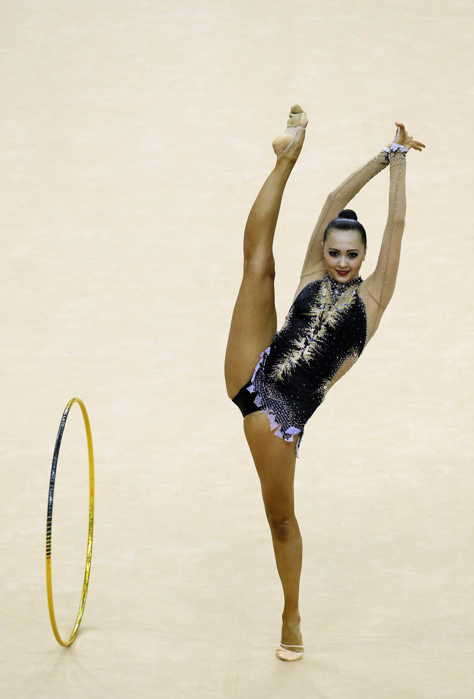 LONDON, ENGLAND - JANUARY 18: Anna Alyabyeva of Kazakhstan in action in the Individual All-Around Final during the FIG Rhythmic Gymnastics at North Greenwich Arena on January 18, 2012 in London, England. (Photo by Ian Walton/Getty Images)