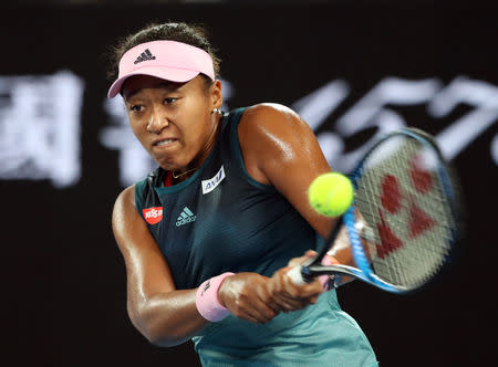 Tennis - Australian Open - First Round - Melbourne Park, Melbourne, Australia, January 15, 2019. Japan’s Naomi Osaka in action during the match against Poland’s Magda Linette. REUTERS/Lucy Nicholson