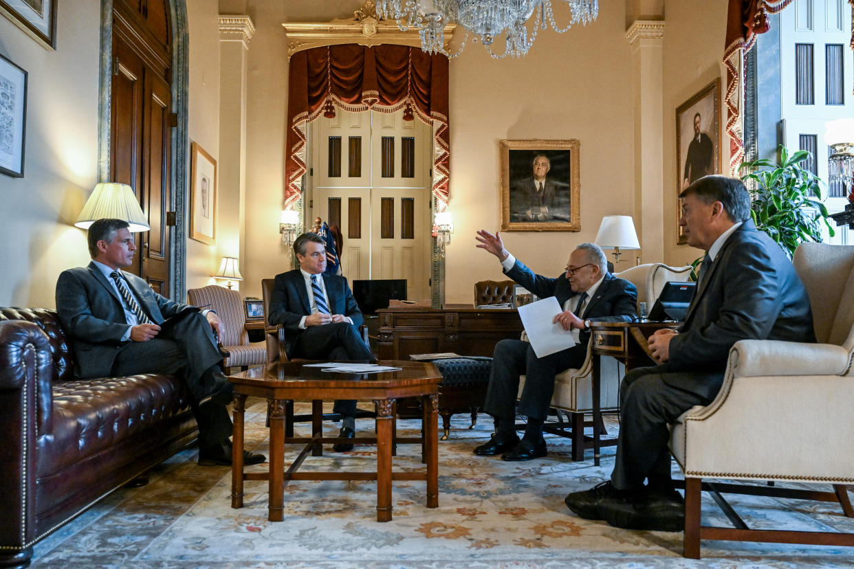 From left, the senators behind a plan for federal legislation on artificial intelligence: Martin Heinrich (D-N.M.), Todd Young (R-Ind.), Chuck Schumer (D-N.Y.) and Mike Rounds (R-S.D.) meet in Schumer’s office ahead of a closed-door meeting concerning A.I. on Capitol Hill in Washington, on May 14, 2024. (Kenny Holston/The New York Times)