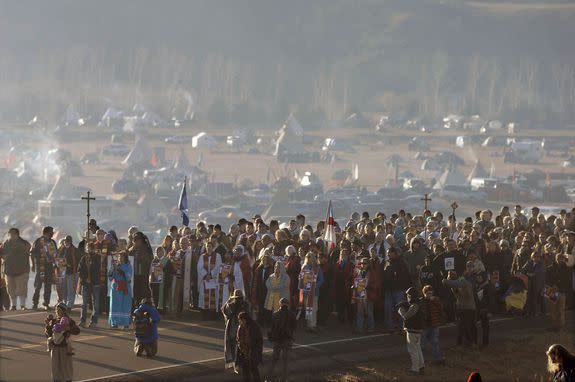 Hundreds clergy of numerous faiths walk on Highway 1806 from the Oceti Sakowin encampment to the site of the violent clash with law enforcement with Dakota Access Pipeline protesters.