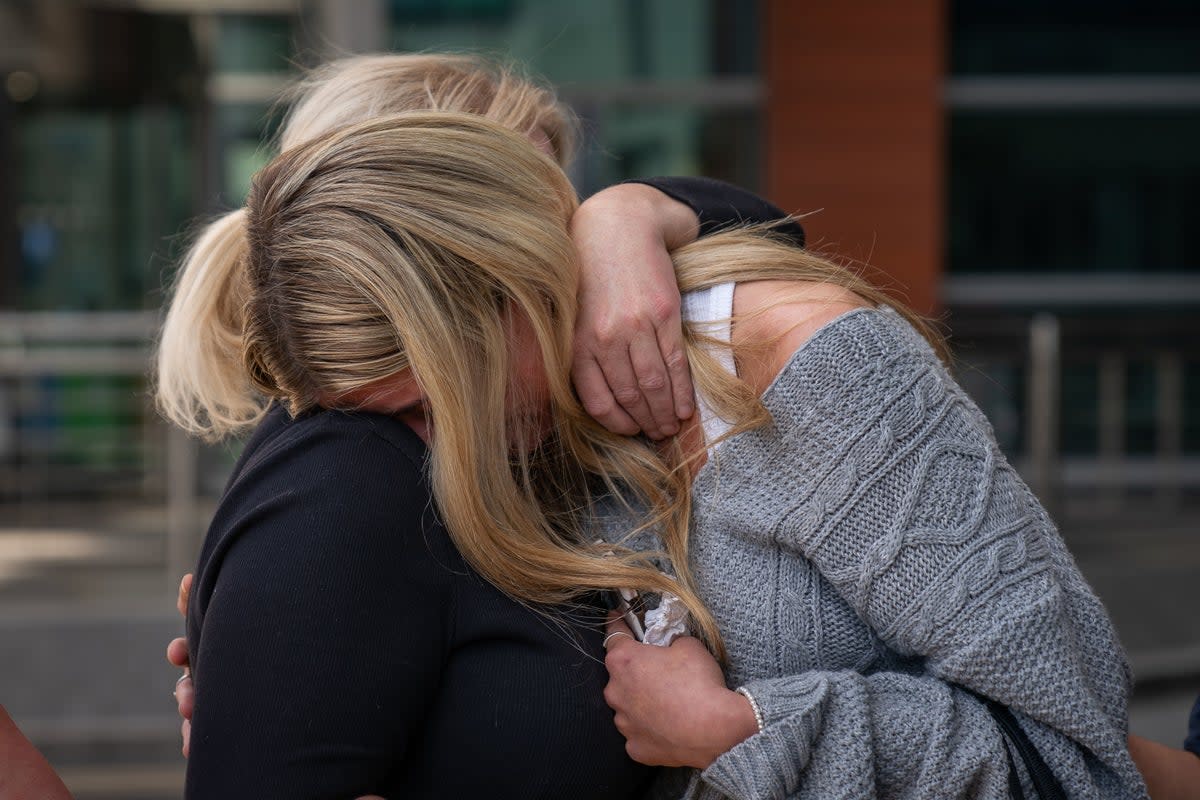 Hollie Dance (left) with Ella Carter  outside the Royal London hospital in Whitechapel, east London (PA)