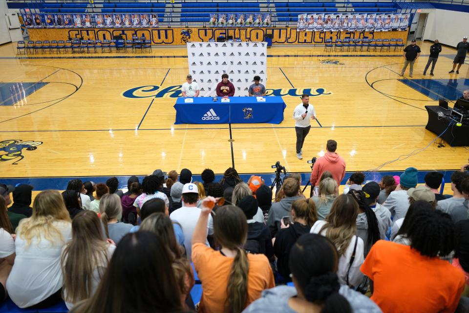 Choctaw coach Jake Corbin talks about his players, Alton Robinson, Missouri State, Cade McConnell, Minnesota, and DeSean Brown, OSU at Choctaw High School, sign letters of intent on national signing day, Wednesday, December 15, 2021. 