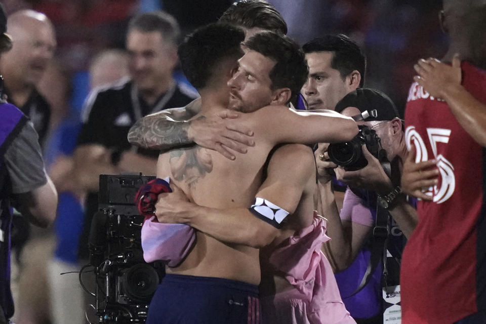 Inter Miami forward Lionel Messi, center right, hugs FC Dallas forward Alan Velasco after they traded jersey following a Leagues Cup soccer match Sunday, Aug. 6, 2023, in Frisco, Texas. (AP Photo/LM Otero)