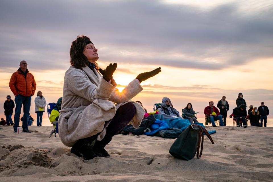 Parishioners gather on a beach April 4 for an Easter Sunday service at sunrise hosted by Hope Community Church in Manasquan, N.J.