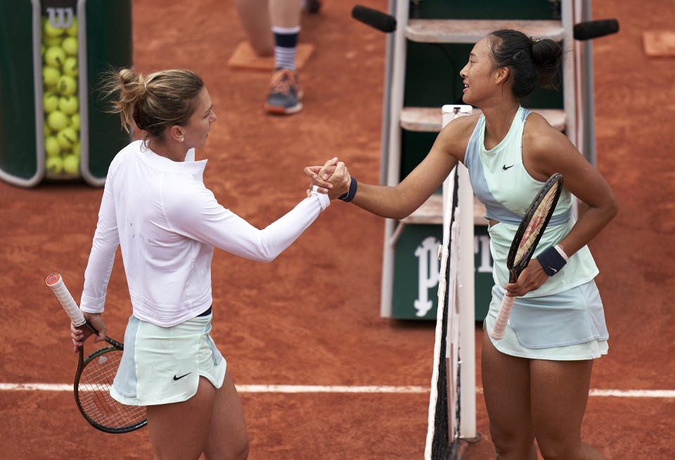 Simona Halep, pictured here congratulating Qinwen Zheng after their match at the French Open.