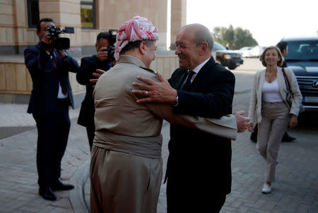 Iraq's Kurdistan region's President Massoud Barzani receives French Foreign Minister Jean-Yves le Drian and French Defence Minister Florence Parly in Erbil, Iraq, August 26, 2017. REUTERS/Azad Lashkari