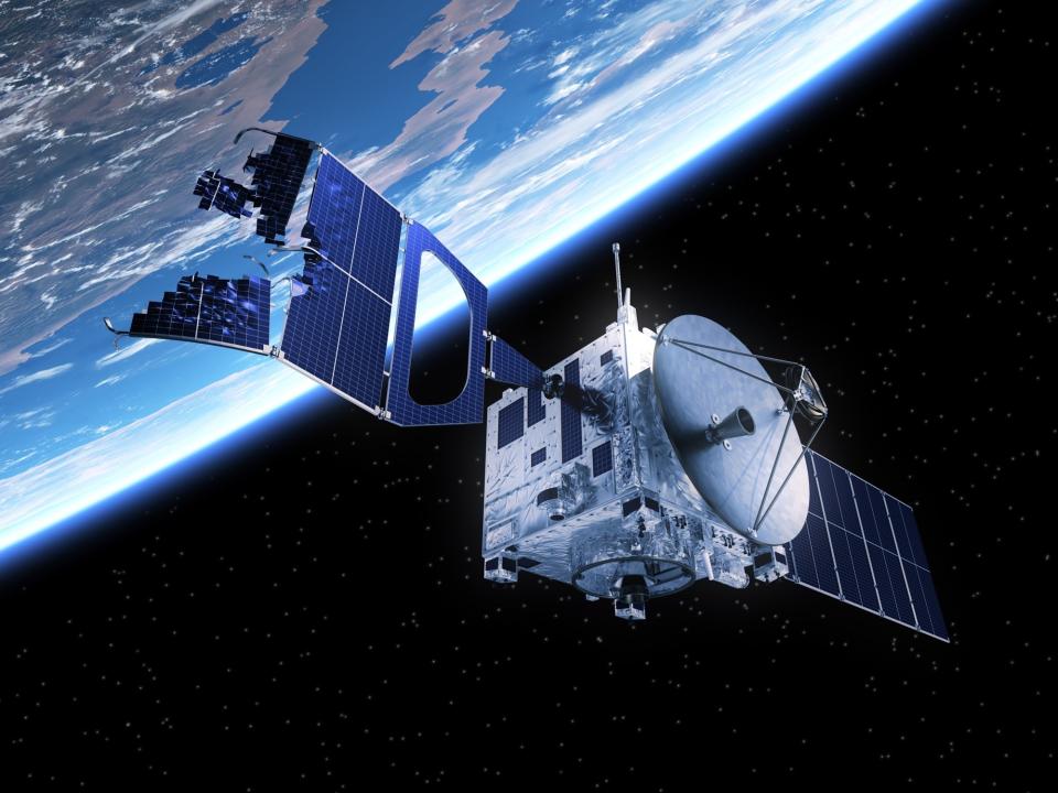 satellite damaged by space debris junk collision shutterstock_348838928