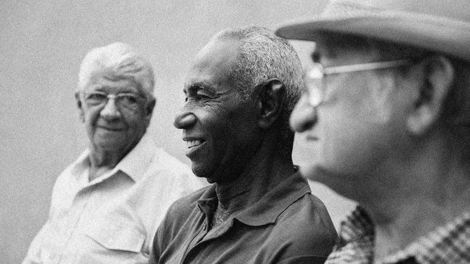 old men sitting together and talking