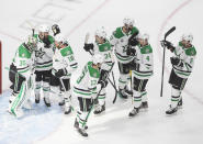 The Dallas Stars celebrate their win over the Tampa Bay Lightning in NHL Stanley Cup finals hockey action in Edmonton, Alberta, Saturday, Sept. 19, 2020. (Jason Franson/The Canadian Press via AP)