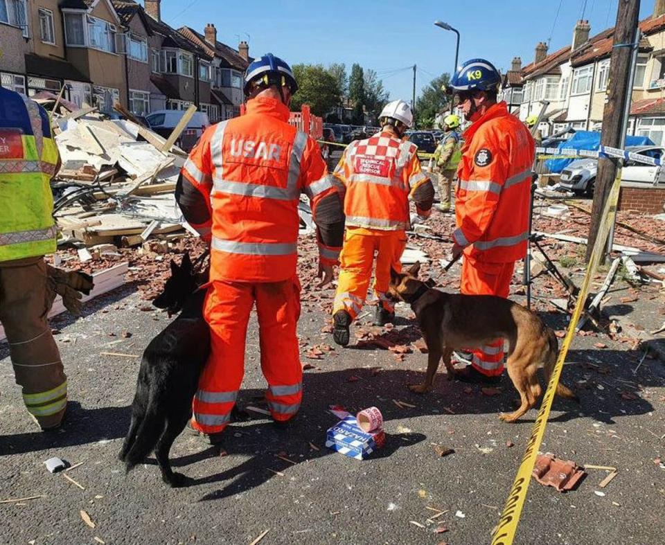 Members of the Urban Search and Rescue team at the scene in Galpin’s Road in Thornton Heath, south London (London Fire Brigade/PA) (PA Media)