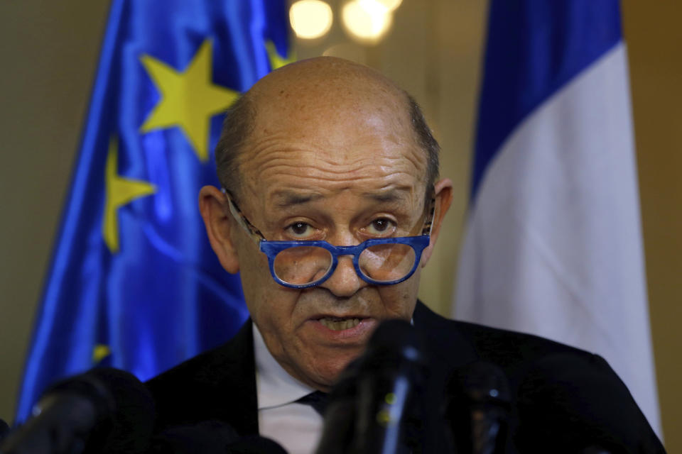 French Foreign Minister Jean-Yves Le Drian, and his Lebanese counterpart Nassif Hitti, hold a news conference following their meeting at the Lebanese foreign ministry in Beirut, Lebanon, Thursday, July. 23, 2020. Le Drian met with Lebanon's president Thursday at the start of his two-day visit to the Mediterranean country that is witnessing the worst economic crisis of its modern history. (AP Photo/Bilal Hussein)