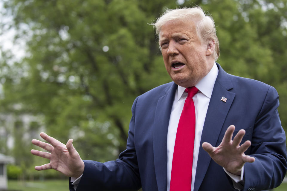 President Donald Trump speaks with reporters on the South Lawn of the White House as he departs on Marine One, Thursday, May 14, 2020, in Washington. Trump is en route to Allentown, Pa. (AP Photo/Alex Brandon)