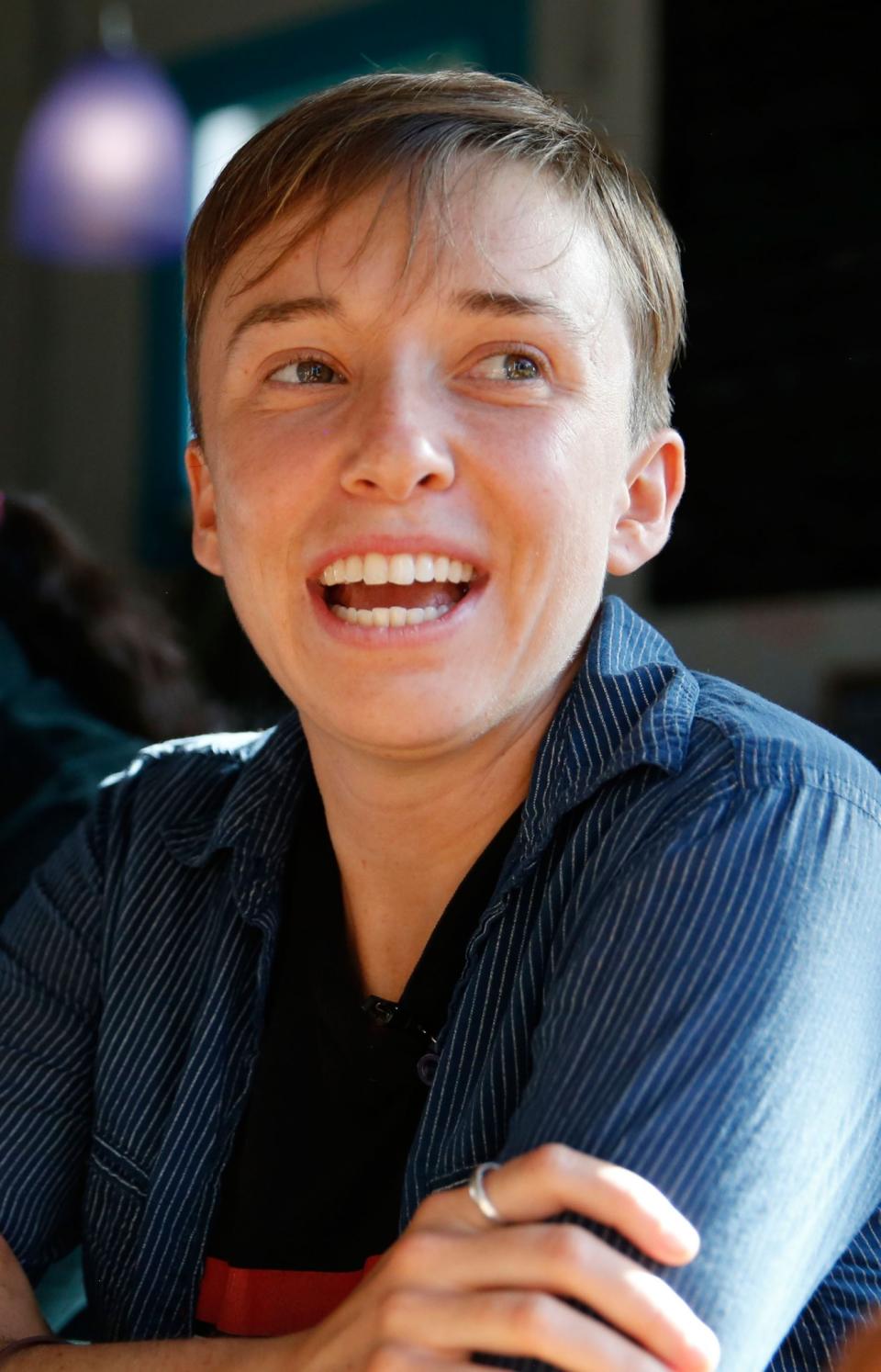 <p>Diana Downard, a Bernie Sanders supporter who now says she will vote for Hillary Clinton, meets with friends in Denver on July 6, 2016. Downard, who is 26, works at a nonpartisan organization in Denver that works to increase civic engagement and voter registration among young people. (AP Photo/Brennan Linsley) </p>