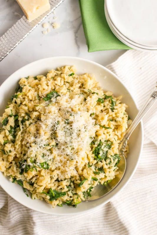 <p>Family Food on the Table</p><p>Brown rice with spinach and parmesan cheese is an easy, healthy, one-pot side dish with just a few simple ingredients!</p><p><strong>Get the recipe: <a href="https://www.familyfoodonthetable.com/brown-rice-spinach-parmesan-cheese/" rel="nofollow noopener" target="_blank" data-ylk="slk:Brown Rice with Spinach and Parmesan Cheese;elm:context_link;itc:0;sec:content-canvas" class="link rapid-noclick-resp">Brown Rice with Spinach and Parmesan Cheese</a></strong></p>