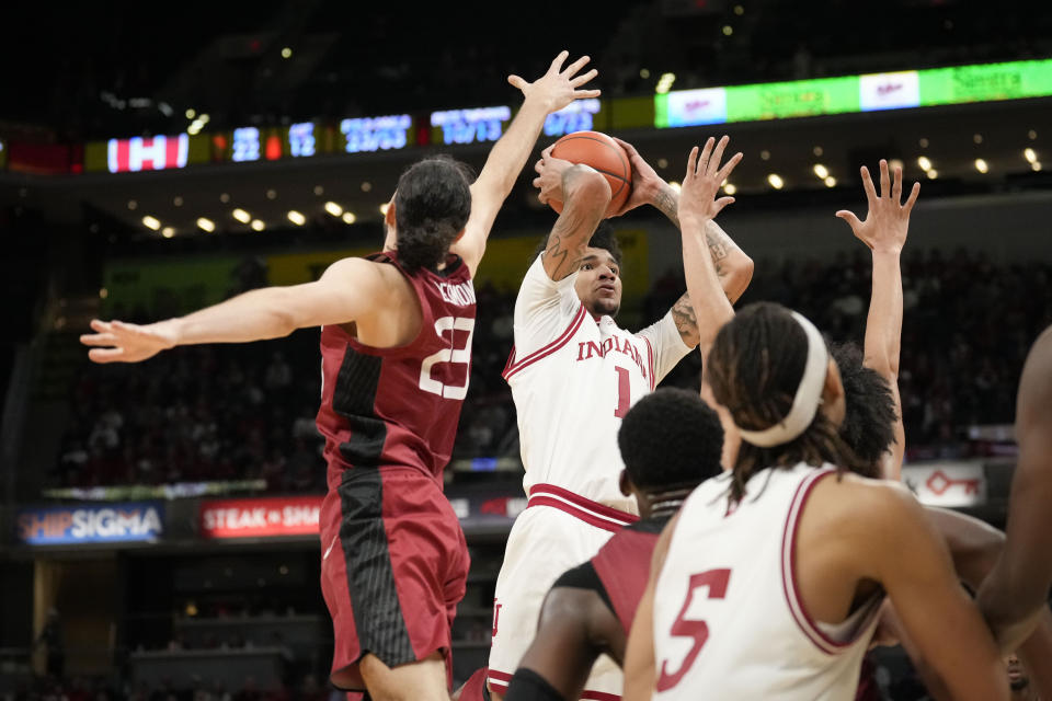 Indiana center Kel'el Ware (1) shoots in front of Harvard guard Louis Lesmond (23) in the second half of an NCAA college basketball game in Indianapolis, Sunday, Nov. 26, 2023. (AP Photo/AJ Mast)
