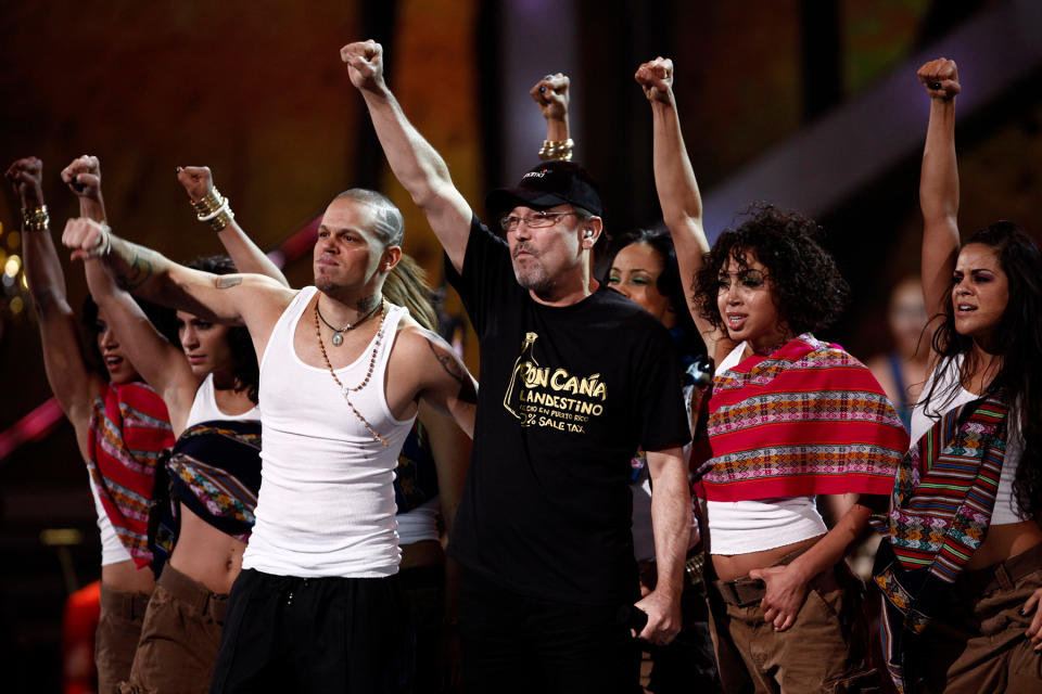 Rene Perez , left, also known as Residente, of the musical group Calle 13, performs with Ruben Blades at the 10th Annual Latin Grammy Awards on Thursday, Nov. 5, 2009, in Las Vegas. (AP Photo/Matt Sayles)