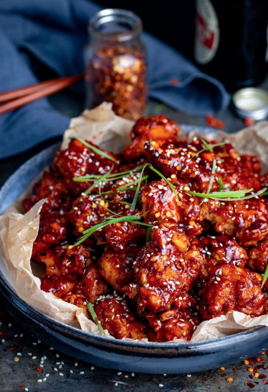 <p>Kitchen Sanctuary</p><p>The best Korean fried chicken—crispy coated buttermilk fried chicken, smothered in a spicy Korean-inspired gochujang sauce.</p><p><strong>Get the recipe: <a href="https://www.kitchensanctuary.com/korean-fried-chicken/" rel="nofollow noopener" target="_blank" data-ylk="slk:Korean Fried Chicken;elm:context_link;itc:0;sec:content-canvas" class="link ">Korean Fried Chicken</a></strong></p>