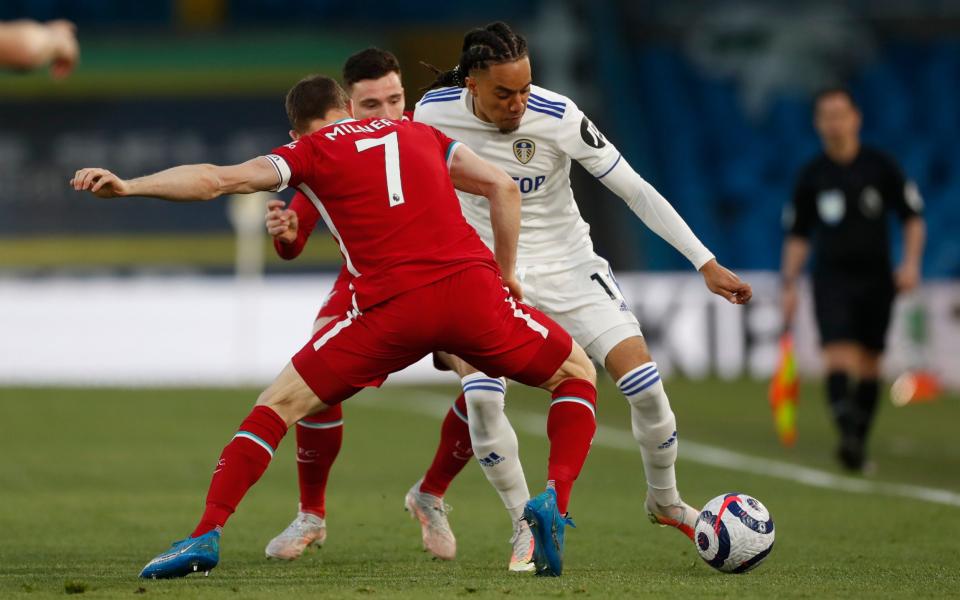 Leeds United's Helder Costa in action with Liverpool's James Milner - Reuters