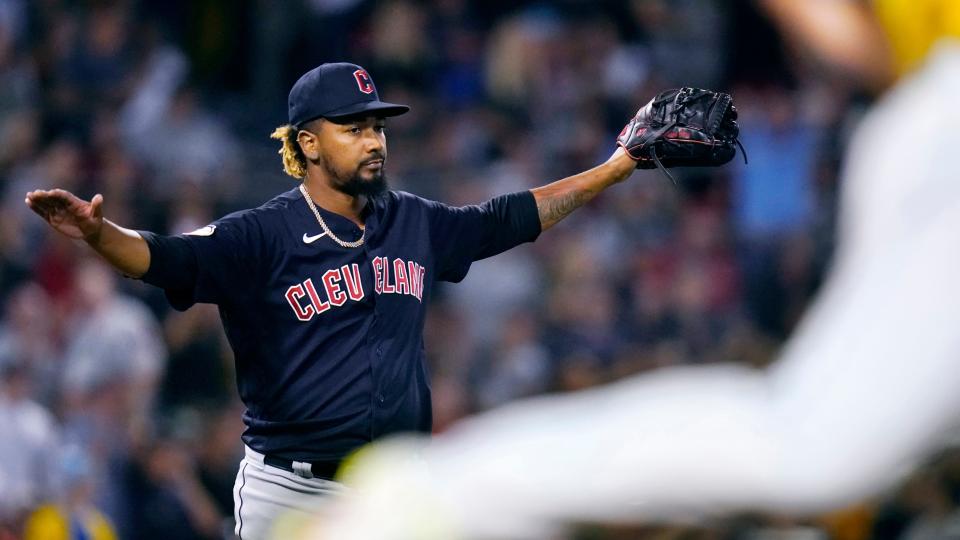 Cleveland Guardians relief pitcher Emmanuel Clase celebrates after the final out of the team's baseball game against the Boston Red Sox at Fenway Park, Wednesday, July 27, 2022, in Boston. Clase got the save in Guardians' 7-6 win. (AP Photo/Charles Krupa)