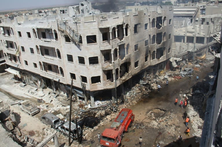 Vue d'immeubles détruits après des raids aériens, le 12 juin 2016 à Idleb (nord-ouest)