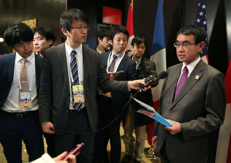 Japan's Minister of Foreign Affairs Taro Kono stops to speak to the media on the second day of Foreign ministers meetings from G7 countries in Toronto, Ontario, Canada April 23, 2018. REUTERS/Fred Thornhill