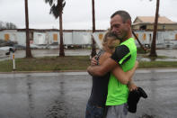 <p>Jessica Campbell hugs Jonathan Fitzgerald (L-R) after riding out Hurricane Harvey in an apartment on August 26, 2017 in Rockport, Texas. (Photo: Joe Raedle/Getty Images) </p>