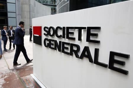 The logo of French bank Societe Generale is seen in front of the bank's headquarters in La Defense near Paris May 7, 2015. REUTERS/Charles Platiau