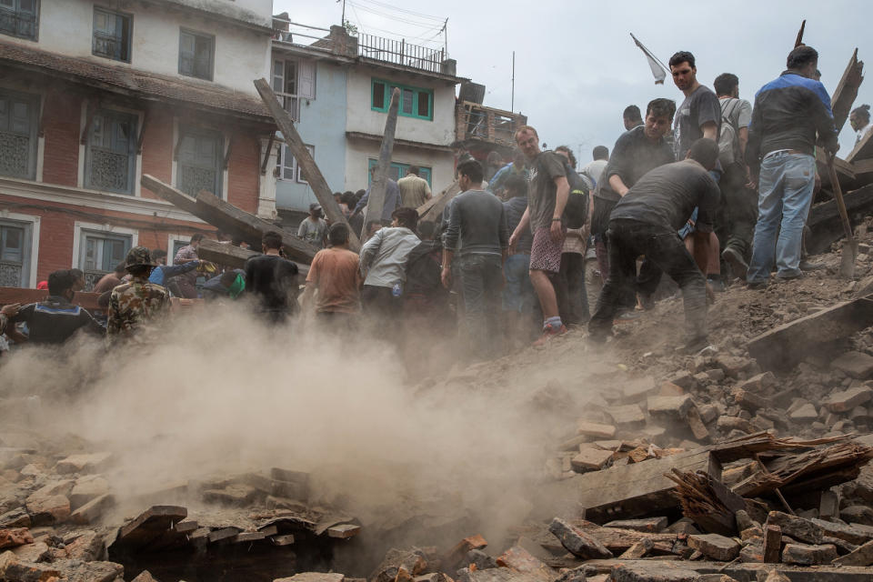 Strong earthquake and aftershocks shake Nepal A powerful earthquake struck Nepal Saturday, killing at least 1,180 people across a swath of four countries as the violently shaking earth collapsed houses, leveled centuries-old temples and triggered avalanches on Mt. Everest. It was the worst tremor to hit the poor South Asian nation in over 80 years. At least 1,130 people were confirmed dead across Nepal, according to the police. Another 34 were killed in India, 12 in Tibet and two in Bangladesh. Two Chinese citizens died in the Nepal-China border. The death toll is almost certain to rise, said deputy Inspector General of Police Komal Singh Bam. (AP) Photography by Omar Havana/Getty Images See more earthquake photos and our other slideshows on Yahoo News.