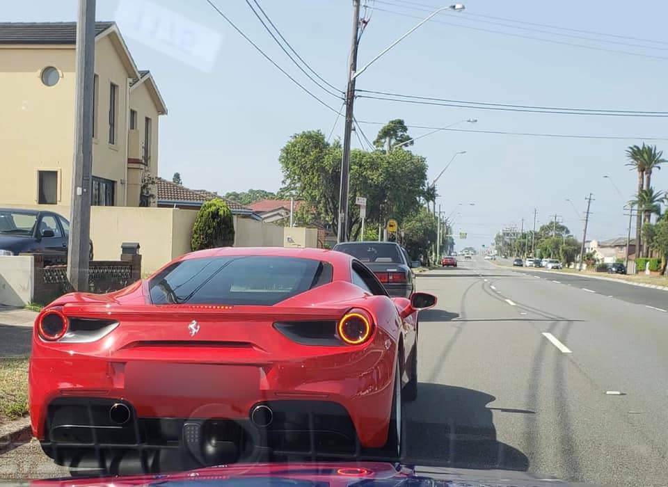 Double demerit points over Australia Day long weekend: The Ferrari (pictured) was caught speeding on Taren Point Road, about 25 kilometres south of Sydney. 