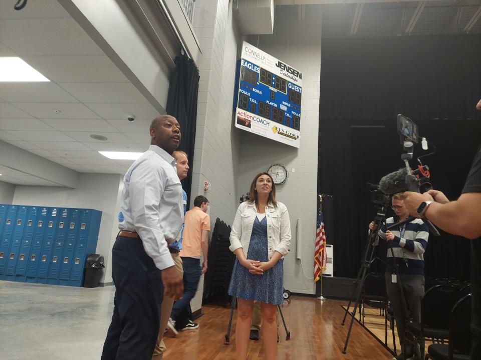 Sen. Tim Scott, R-S.C., tours Siouxland Christian School in Sioux City, May 24, 2023, with principal Katie Trimble. The school was Scott's first stop on his first Iowa campaign trip since announcing his candidacy for president on Monday.