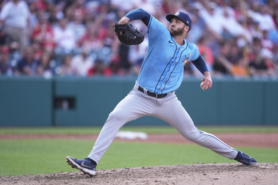 Tampa Bay Rays' Colin Poche pitches in the seventh inning of a baseball game against the Cleveland Guardians, Sunday, Sept. 3, 2023, in Cleveland. (AP Photo/Sue Ogrocki)