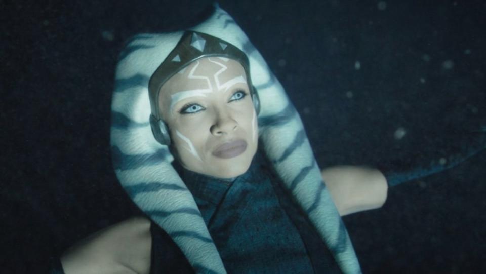 Ahsoka Tano opens her eyes when a beam of light hits her under water