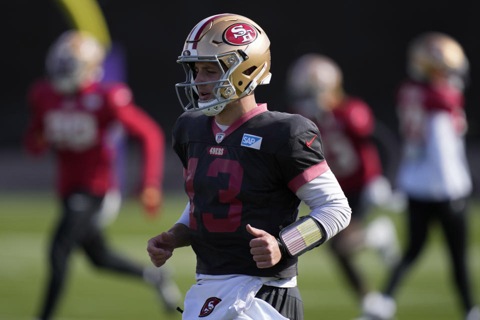 San Francisco 49ers quarterback Brock Purdy (13) warms up during a practice ahead of the Super Bowl 58 NFL football game Thursday, Feb. 8, 2024, in Las Vegas. (AP Photo/John Locher)