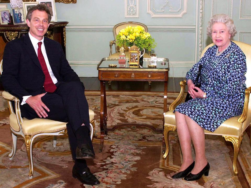 Tony Blair and Queen Elizabeth in 2002, sitting in opposite chairs