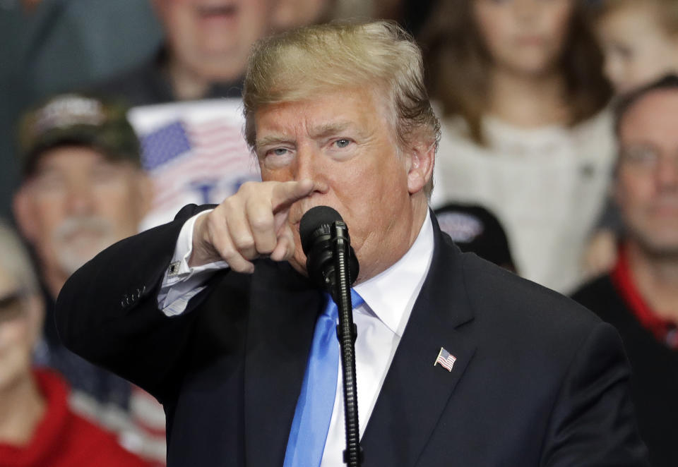 In this Oct. 26, 2018 photo, President Donald Trump points to the media as he speaks during a campaign rally in Charlotte, N.C. Trump is accusing the media of being “the true Enemy of People” in the wake of a mass shooting and a mail bomb plot.(AP Photo/Chuck Burton)