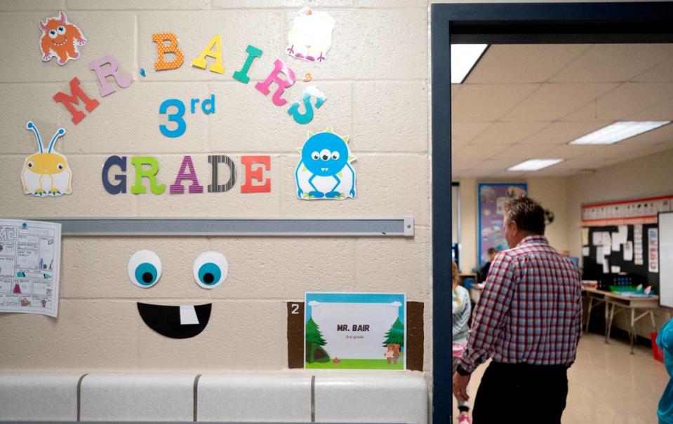 Head teacher Jason Bair greets his third grade class at Mountaintop Elementary on Thursday, Nov. 2, 2023.