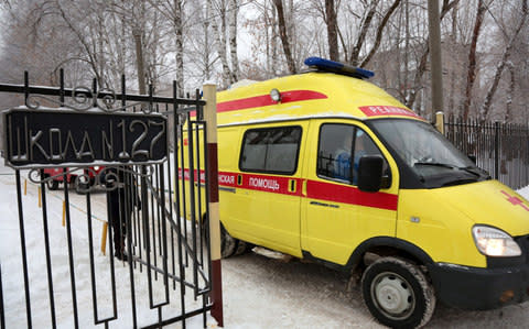 An ambulance arrives at the school after the knife attack - Credit: Maxim Kimerling/TASS via Getty Images