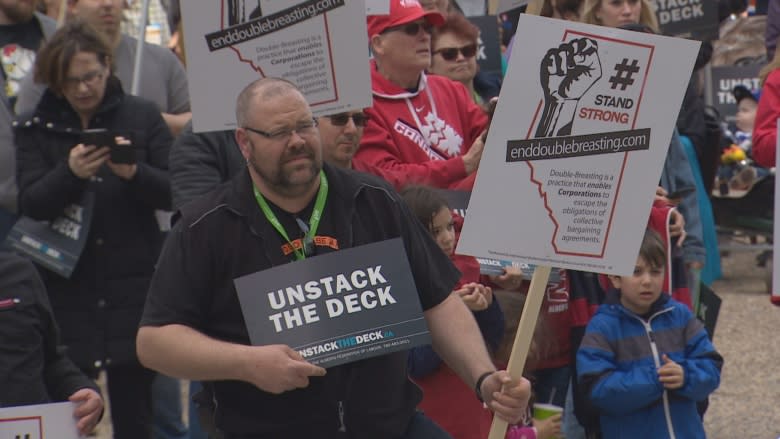 Union members rally at the Alberta legislature for stricter labour laws